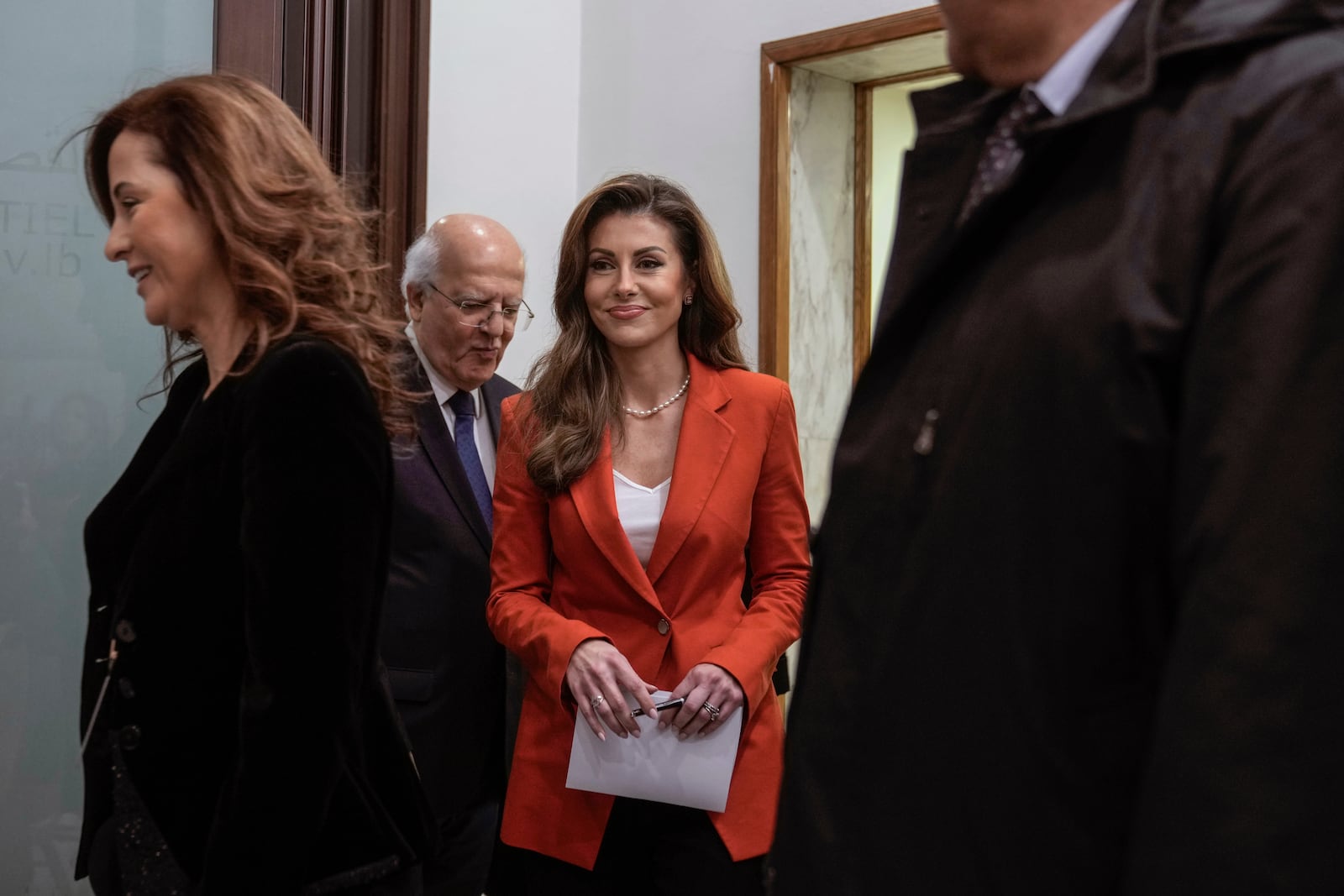 U.S. deputy special envoy for Middle East peace Morgan Ortagus, center, arrives ahead of a press conference after her meeting with Lebanese President Joseph Aoun in Baabda, east of Beirut, Lebanon, Friday, Feb. 7, 2025. (AP Photo/Bilal Hussein)