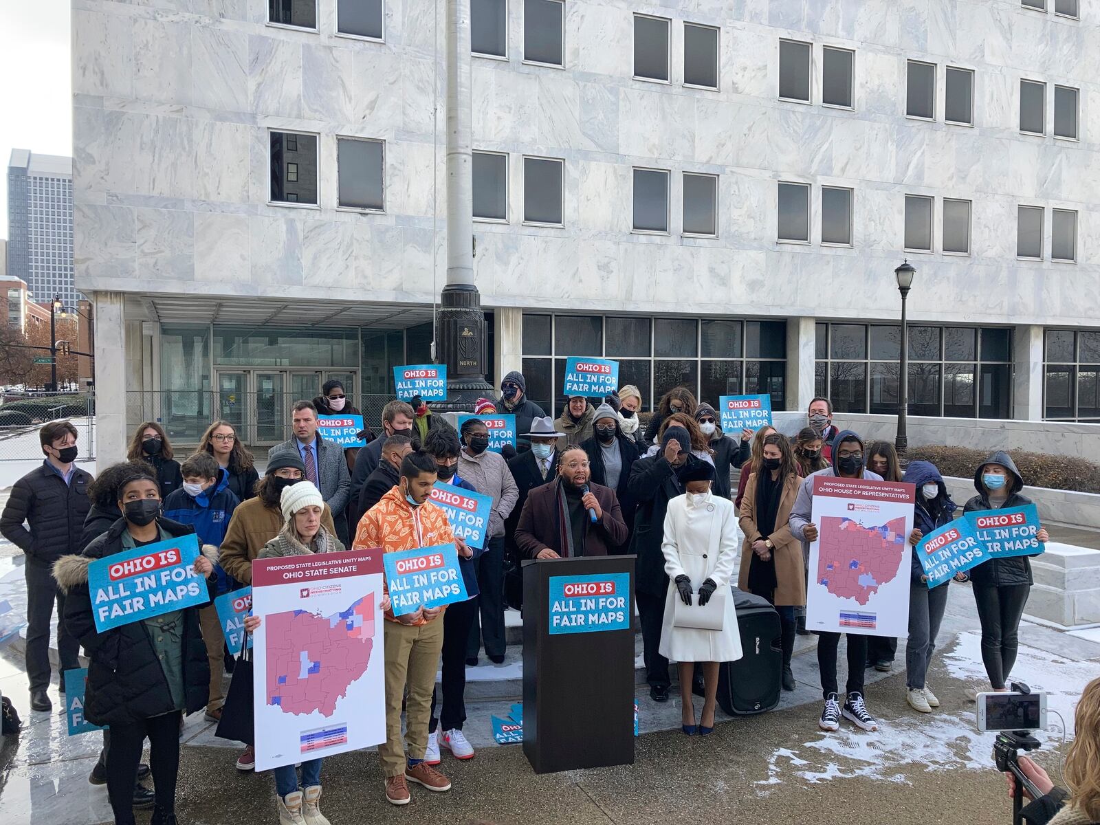 Advocates who believe that newly drawn Ohio legislative maps remain heavily gerrymandered rally outside the Ohio Supreme Court on Wednesday, Dec. 8, 2021, in Columbus, Ohio. The court on Wednesday Jan. 12, 2022 overturned the maps. (AP Photo/Andrew Welsh-Huggins)