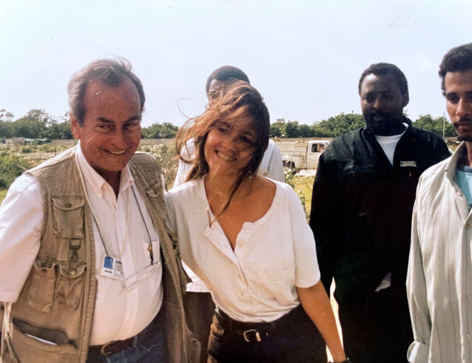 AP bureau chief Reid G. Miller, left, greets correspondent Tina Susman in Mogadishu, Somalia, on July 8, 1994, moments after kidnappers released her from 20 days in captivity. (AP Photo/Sayyid Azim)