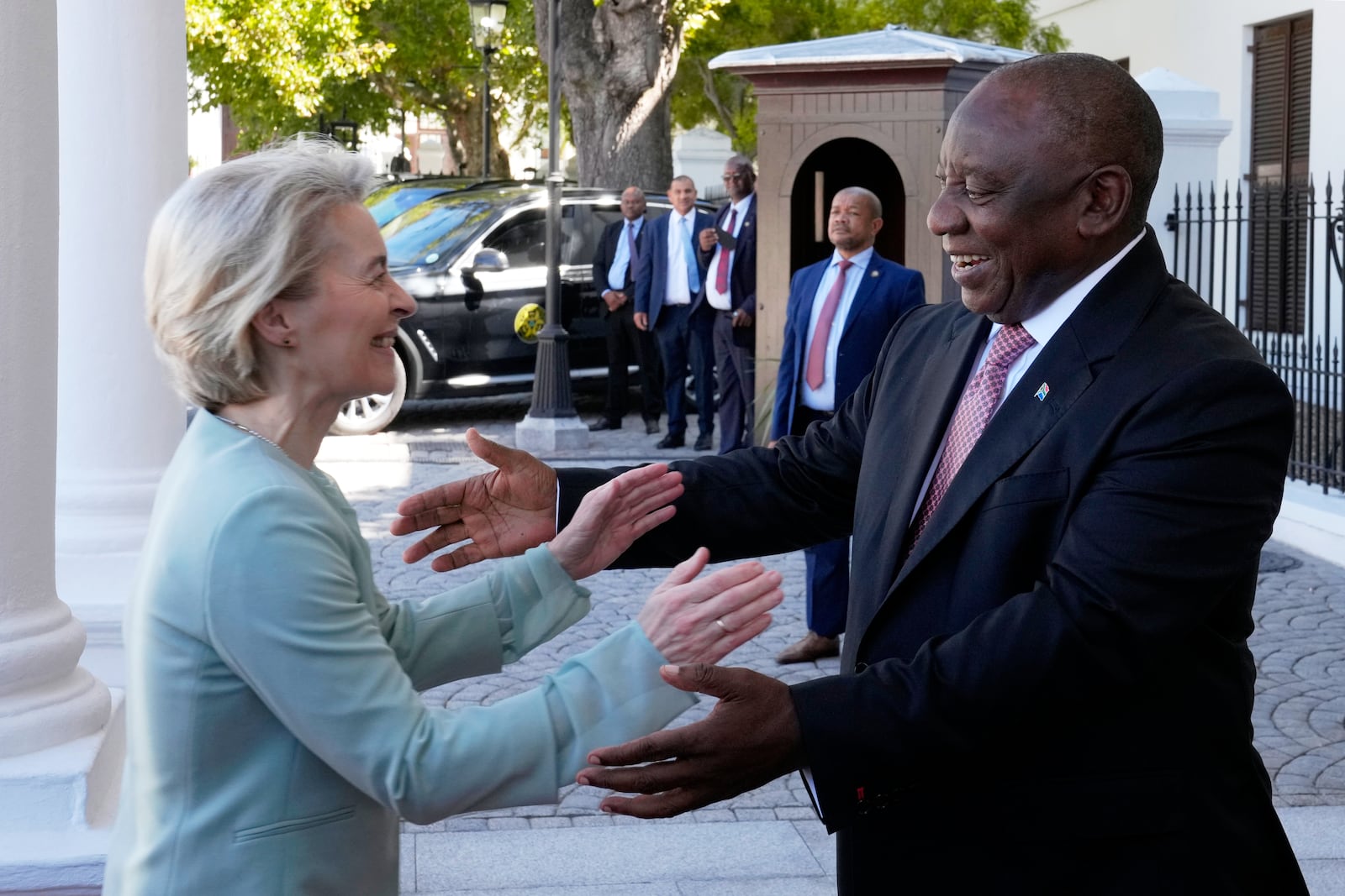 South Africa's President Cyril Ramaphosa, right, welcomes Ursula von der Leyen, the European Commission President, ahead of the eighth EU-South Africa summit in Cape Town, South Africa, Thursday, March 13, 2025. (AP Photo/Nardus Engelbrecht)