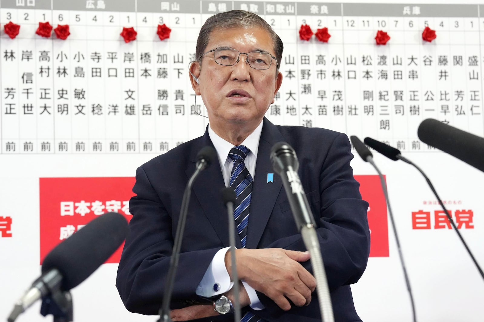 Japan's Prime Minister and president of the Liberal Democratic Party (LDP) Shigeru Ishiba speaks to the media regarding the early result of lower house election, at the LDP headquarters Sunday, Oct. 27, 2024, in Tokyo, (Kyodo News via AP)