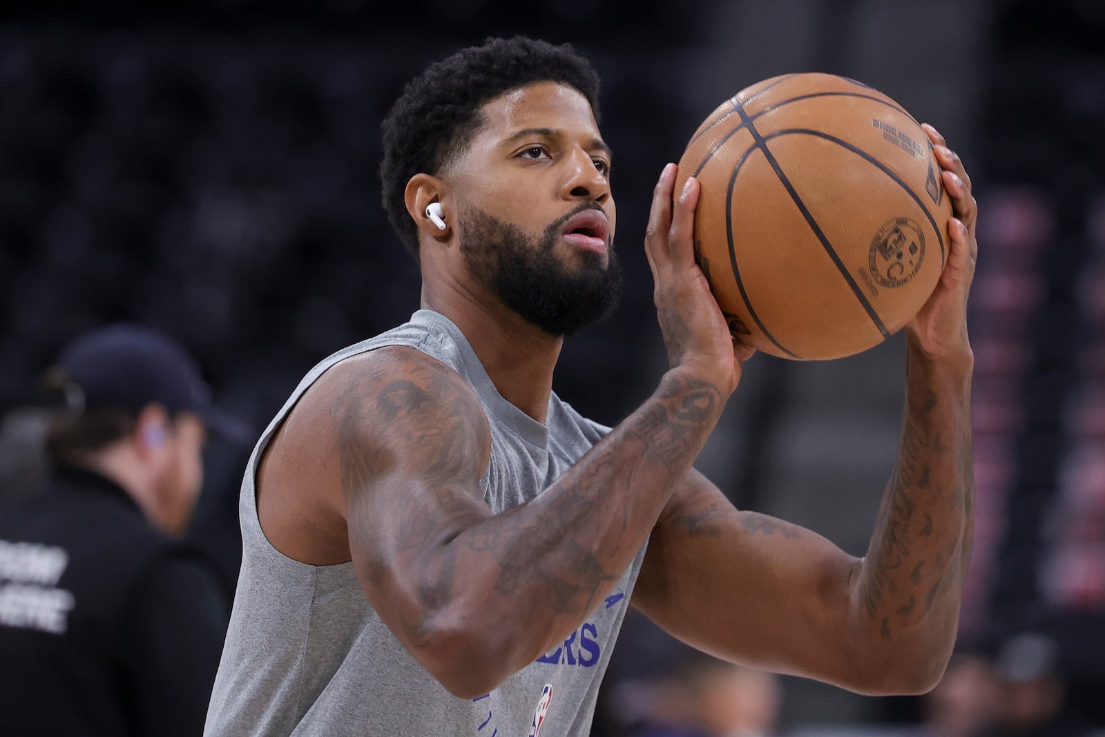 Philadelphia 76ers forward Paul George warms up before an NBA basketball game against the Los Angeles Clippers, Wednesday, Nov. 6, 2024, in Inglewood, Calif. (AP Photo/Ryan Sun)