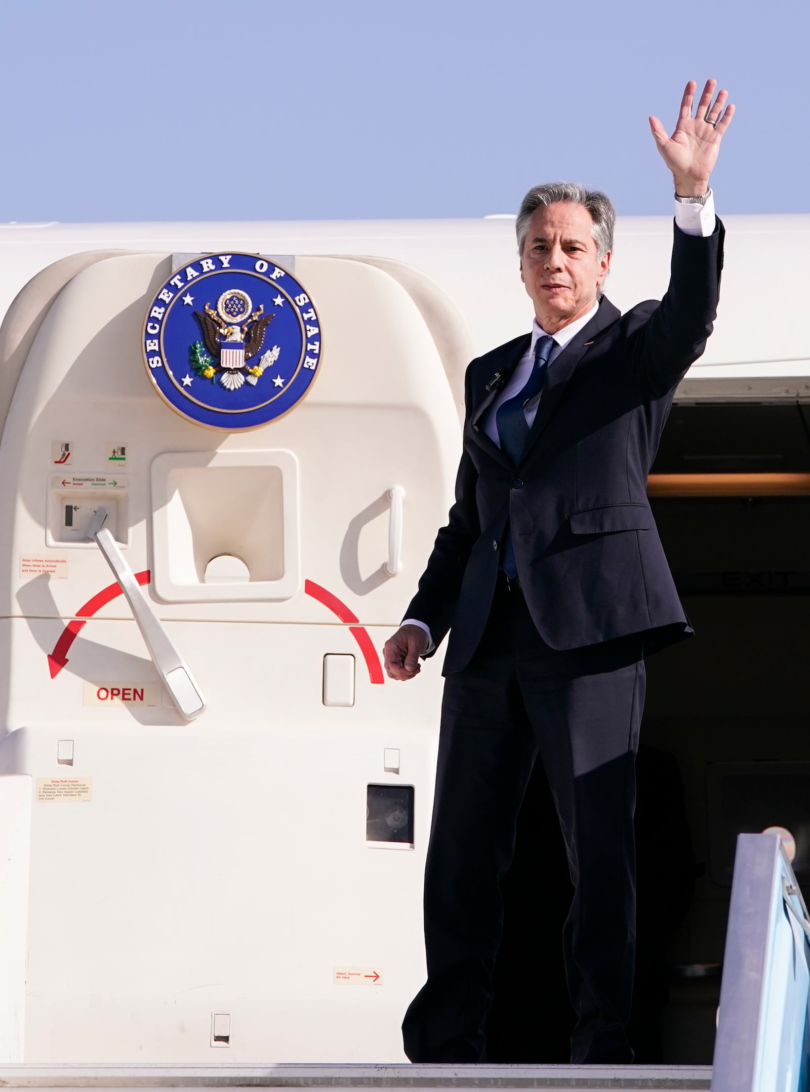 U.S. Secretary of State Antony Blinken waves as he departs for Riyadh, Saudi Arabia, from Ben Gurion International Airport in Tel Aviv, Israel, Wednesday, Oct. 23, 2024. (Nathan Howard/Pool Photo via AP)