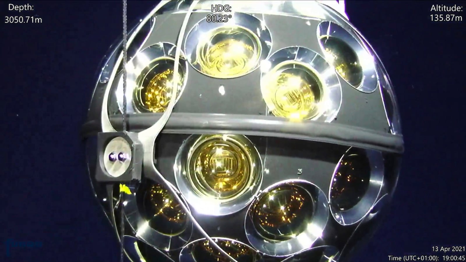 A sphere used to detect neutrinos is shown submerged in the Mediterranean Sea. (KM3NeT via AP)