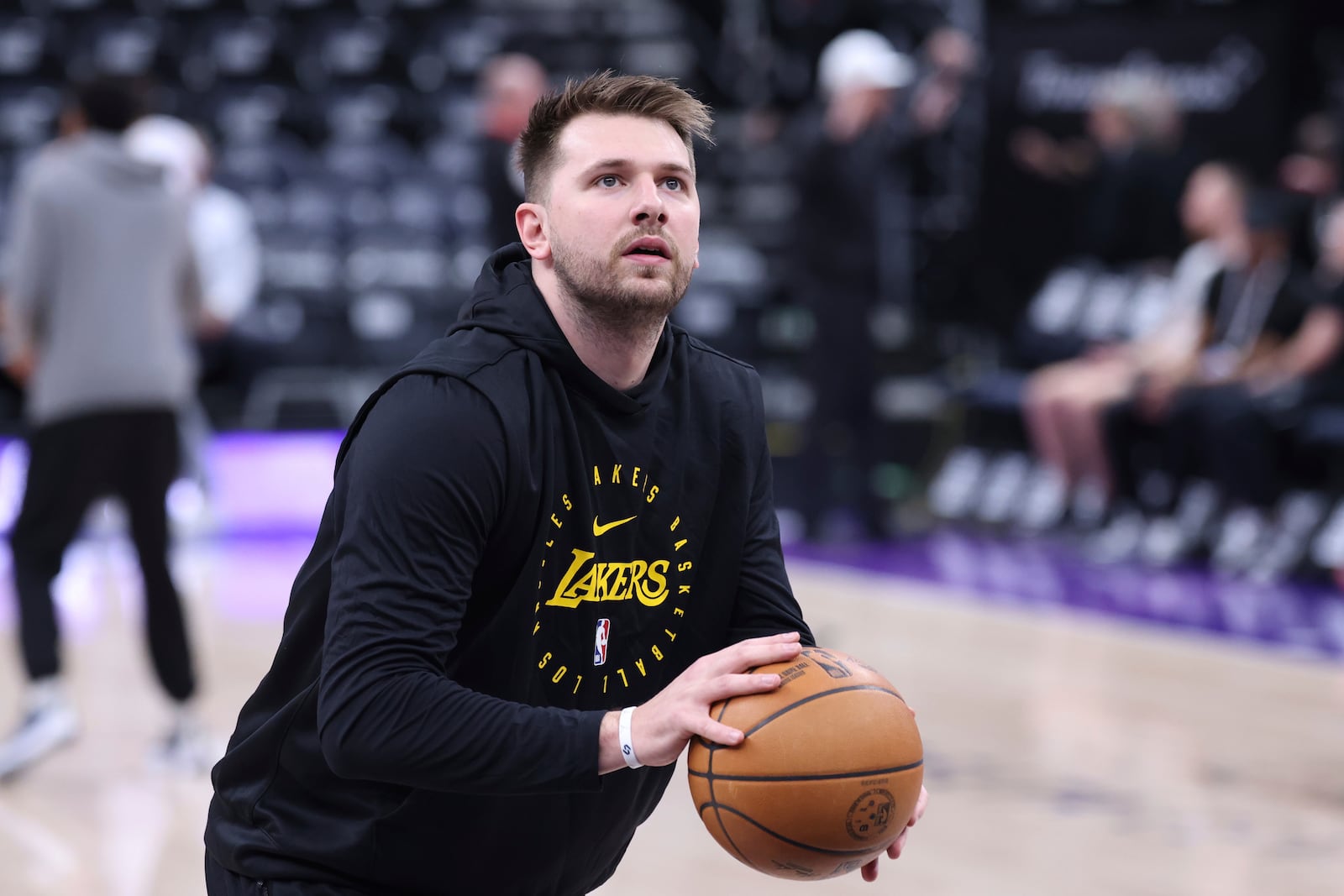 Los Angeles Lakers guard Luka Doncic warms up before an NBA basketball game against the Utah Jazz, Wednesday, Feb. 12, 2025, in Salt Lake City. (AP Photo/Rob Gray)