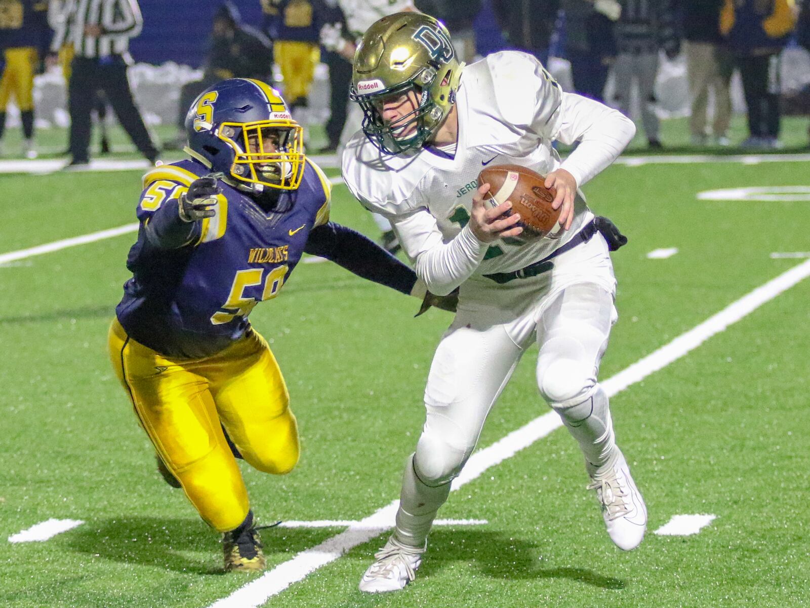 Springfield High School senior Te'Vion Gilbreth sacks Dublin Jerome quarterback Ryan Miller during the Wildcats 37-14 victory over the Celtics in a D-I, Region 2 semifinal game at Marysville High School on Friday, Nov. 15. CONTRIBUTED PHOTO BY MICHAEL COOPER