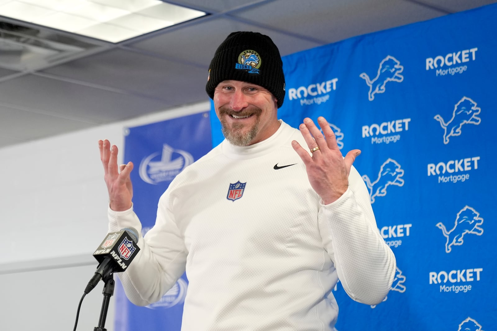 Detroit Lions head coach Dan Campbell reacts as he talks to reporters after an NFL football game against the Chicago Bears on Sunday, Dec. 22, 2024, in Chicago. (AP Photo/Erin Hooley)