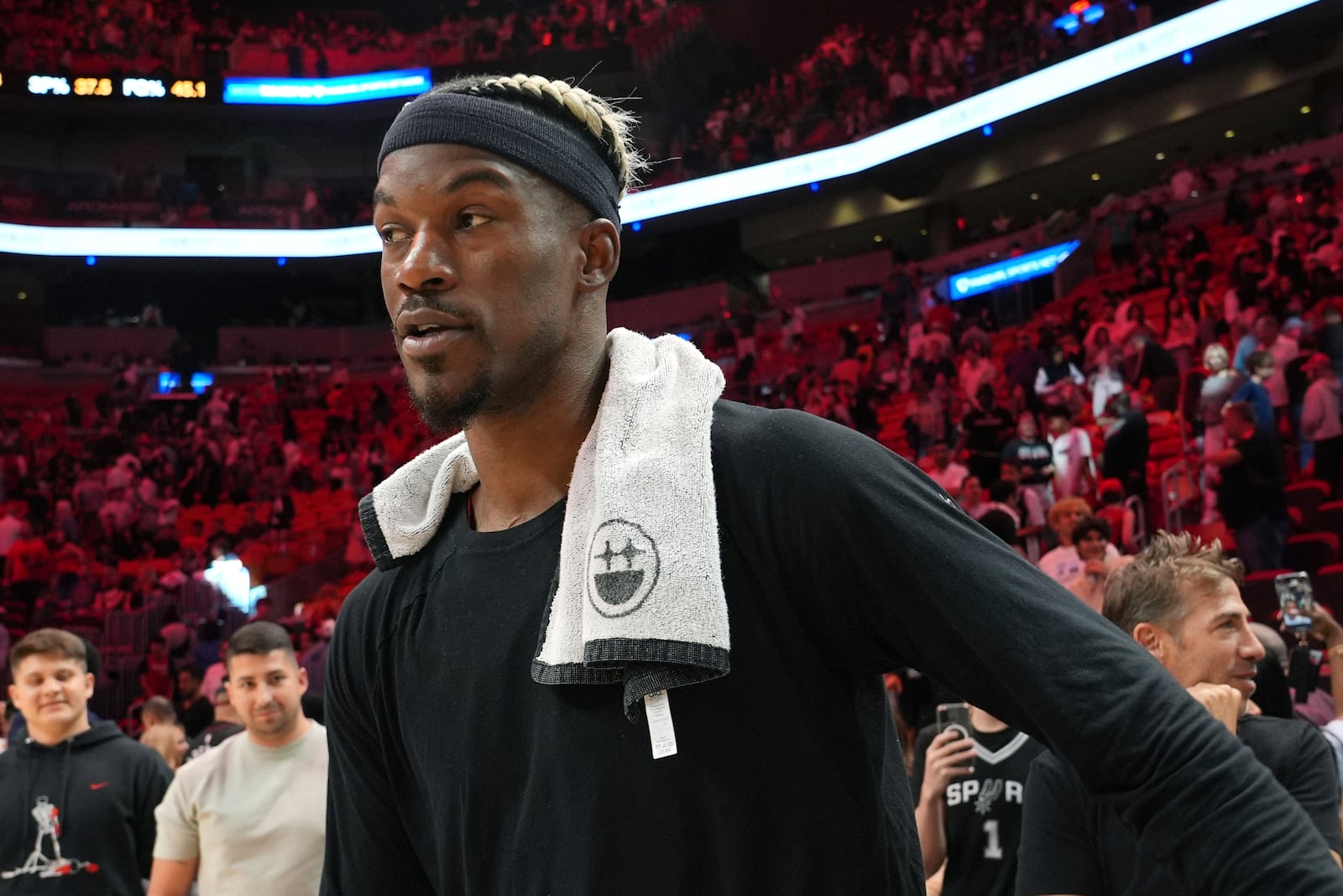 Miami Heat forward Jimmy Butler walks on the court after an NBA basketball game against the San Antonio Spurs, Sunday, Jan. 19, 2025, in Miami. (AP Photo/Lynne Sladky)