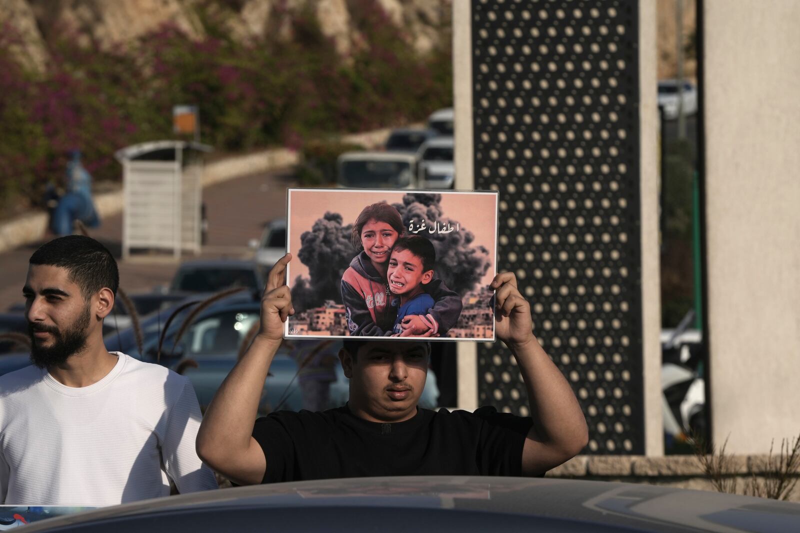 Palestinian citizens of Israel protest against Israel's military operations in the Gaza Strip and Lebanon, in Umm Al-Fahm, Israel, Saturday, Nov. 9, 2024. (AP Photo/Mahmoud Illean)