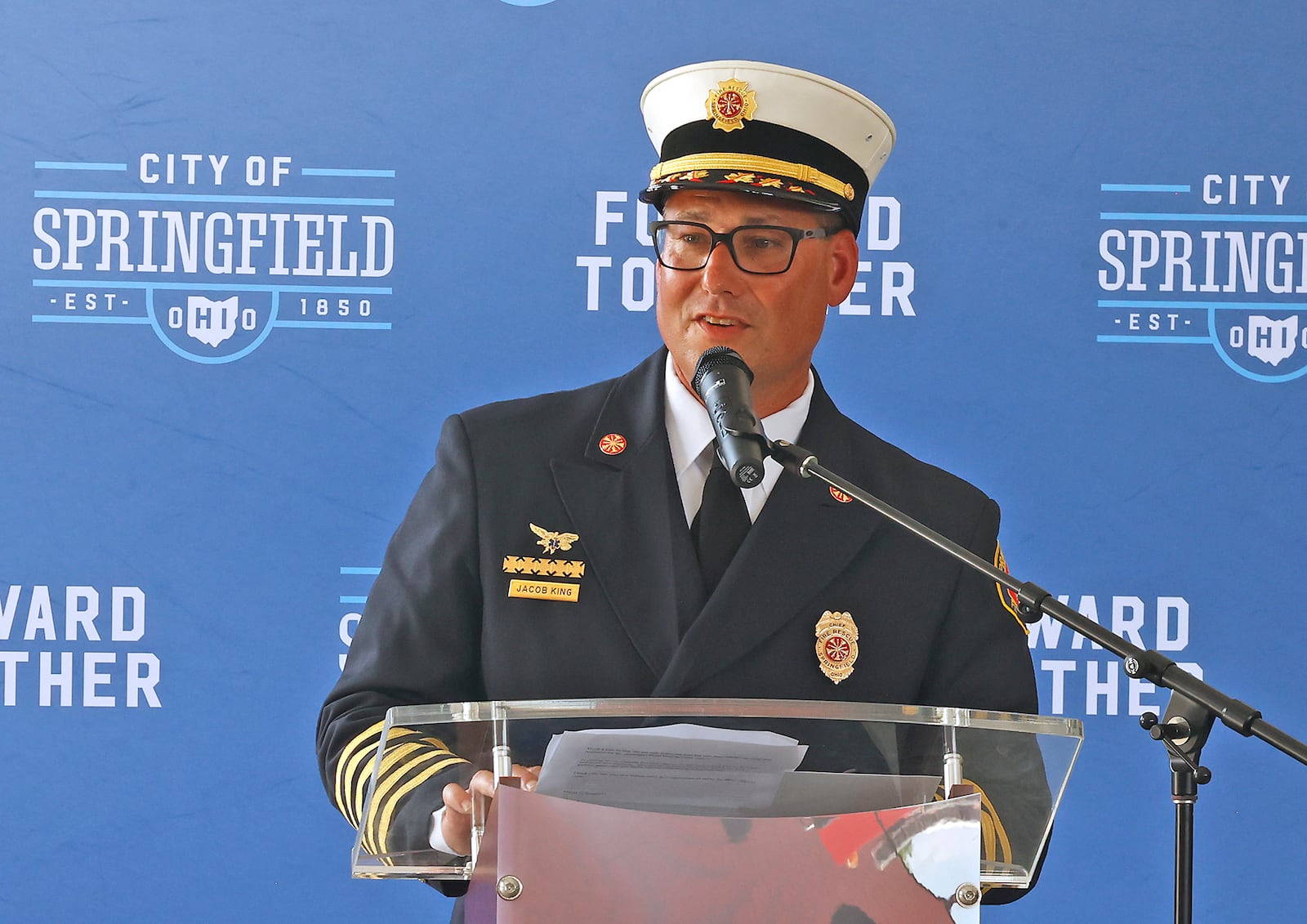 Springfield Fire and Rescue Division Fire Chief Jacob King speaks during the ribbon cutting ceremony and open house for the new Fire Station #8 Monday, July 8, 2024. BILL LACKEY/STAFF