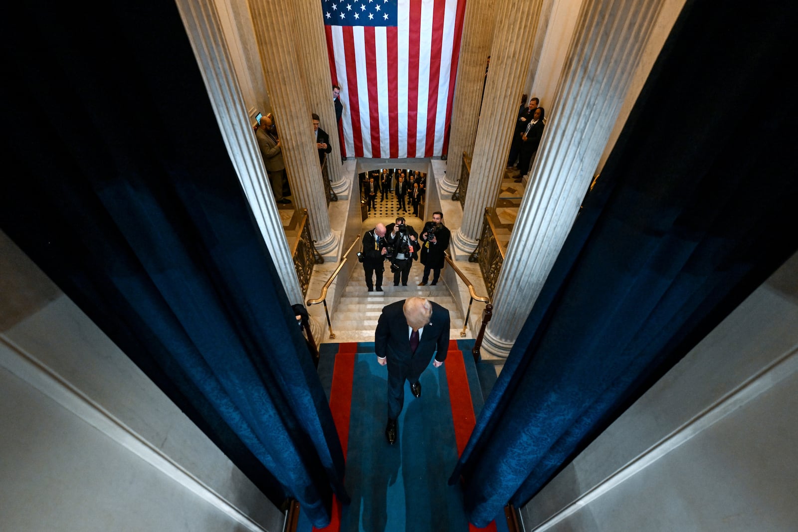 President-elect Donald Trump arrives at the 60th Presidential Inauguration in the Rotunda of the U.S. Capitol in Washington, Monday, Jan. 20, 2025. (Kenny Holston/The New York Times via AP, Pool)