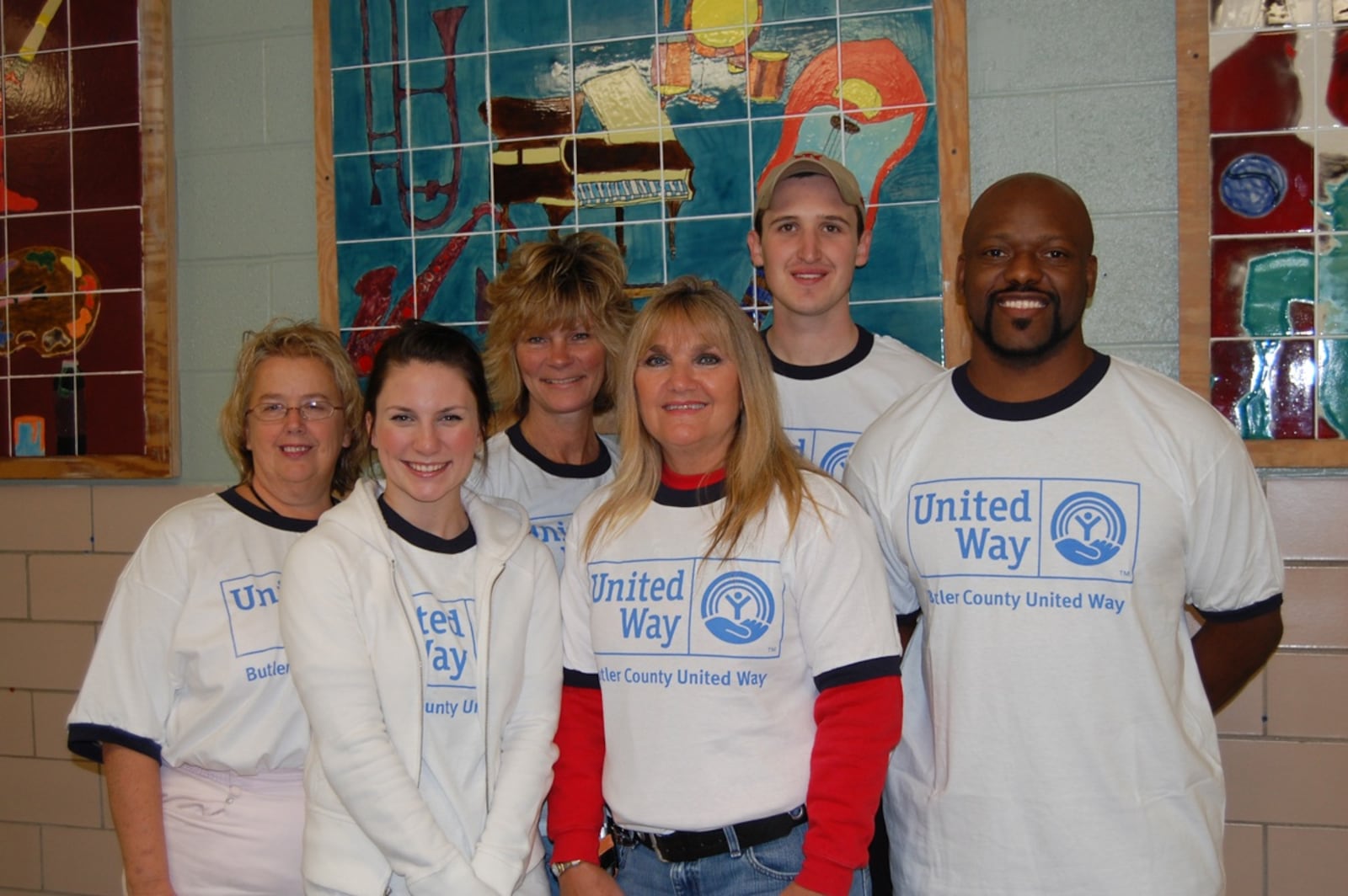 Volunteers from Ohio Casualty Group pose at Fairfield Middle School during United Ways 2007 Fall Day of Caring kickoff Pancake Breakfast; left to right: Cathy Armbruster, Lezley Crawford, Debbi Crawford, Judy Bailey, Nate Schmitt, Wade Chapman.