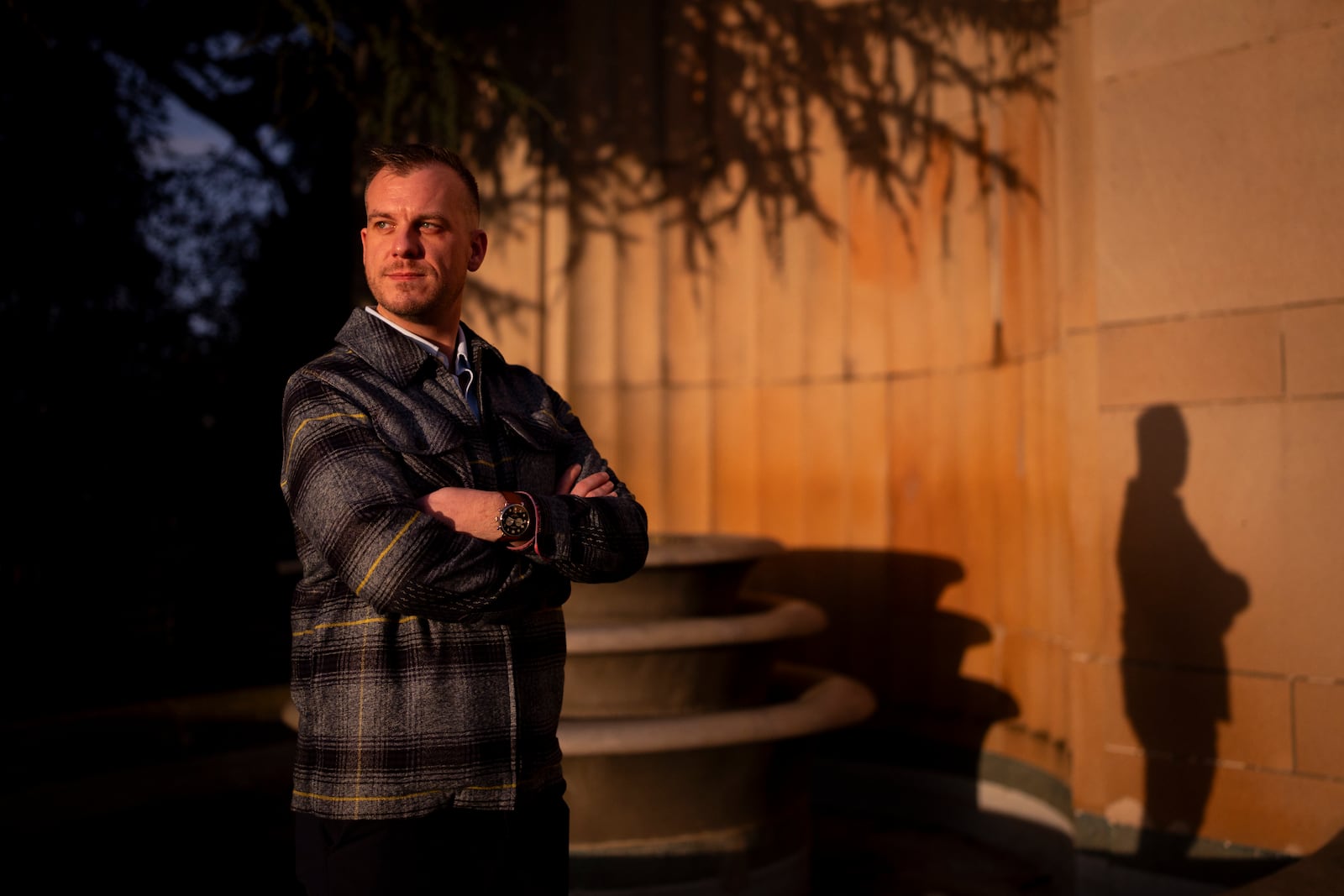 Recreational rugby player Sean McDowell, whose SafeSport case investigator Jason Krasley was fired after being arrested for stealing drug money in his previous job as a police officer, poses for a portrait Wednesday, Dec. 18, 2024, in Seattle. (AP Photo/Lindsey Wasson)