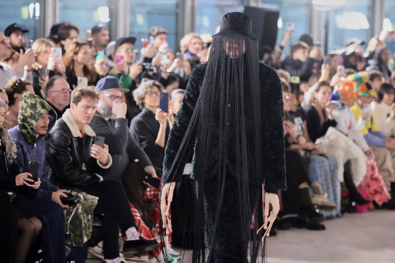 A model wears a creation as part of the men's Walter van Beirendonck Fall-Winter 2025-2026 collection, that was presented in Paris, Wednesday, Jan. 22, 2025. (AP Photo/Thomas Padilla).