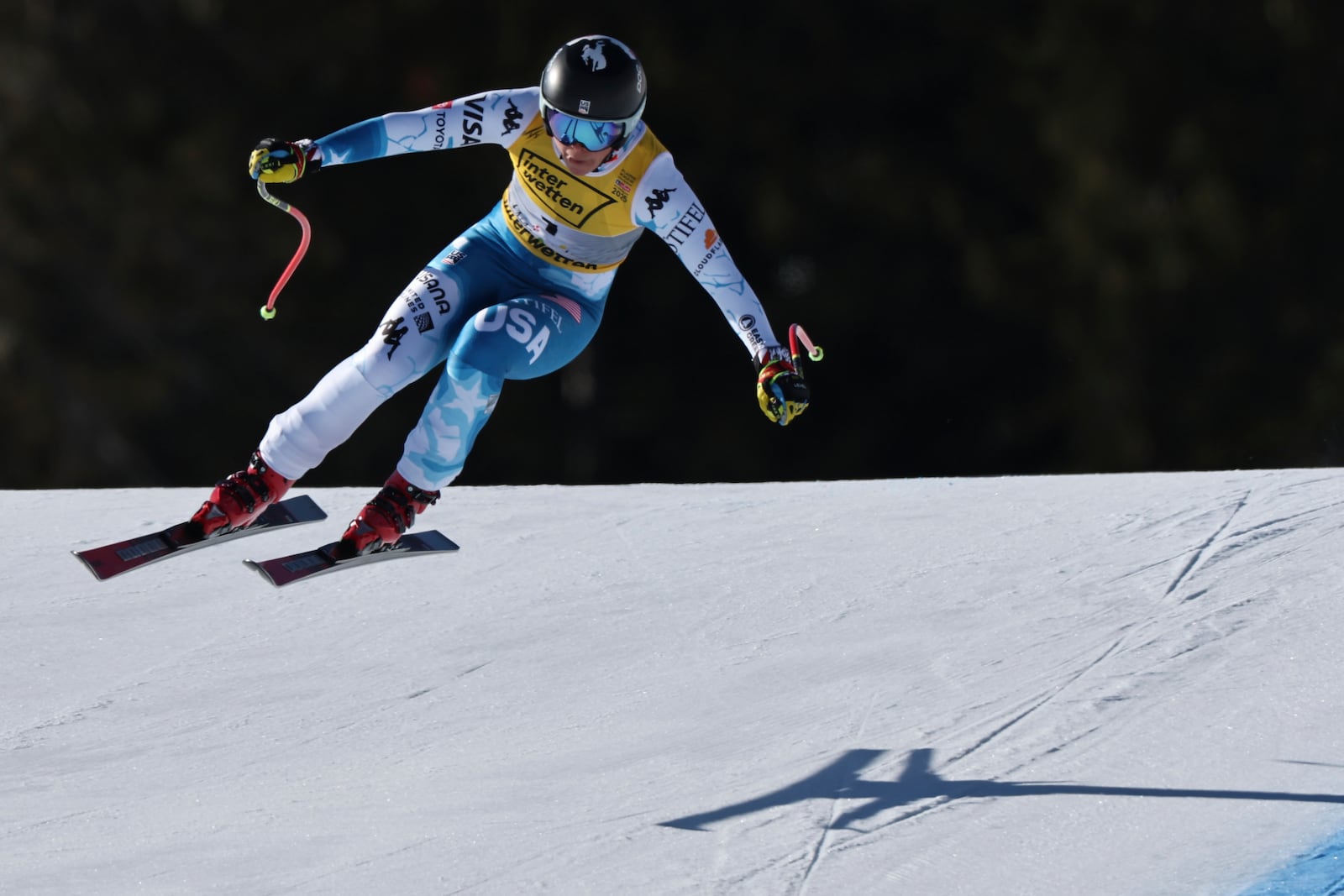 United States' Breezy Johnson speeds down the course during a women's downhill race, at the Alpine Ski World Championships, in Saalbach-Hinterglemm, Austria, Saturday, Feb. 8, 2025. (AP Photo/Marco Trovati)