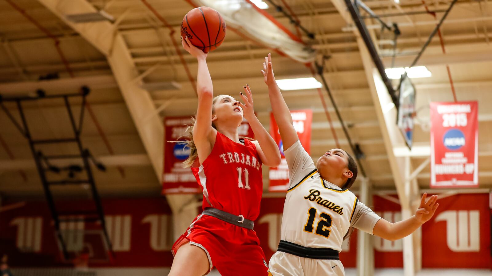 Cutline 2: Southeastern junior Brooke Nelson shoots over Shawnee's Aaliyah Perrin during their game on Thursday, Dec. 28, 2023 at the Clark County Basketball Showcase at Pam Evans Smith Arena in Springfield. Michael Cooper/CONTRIBUTED