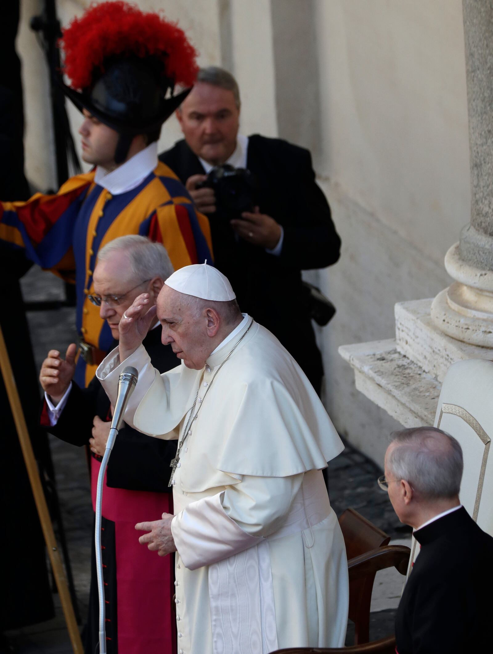 Pope Francis makes the sign of the cross during his weekly general audience general audience in San Damaso courtyard at the Vatican, Wednesday, Sept. 9, 2020. (AP Photo/Andrew Medichini)