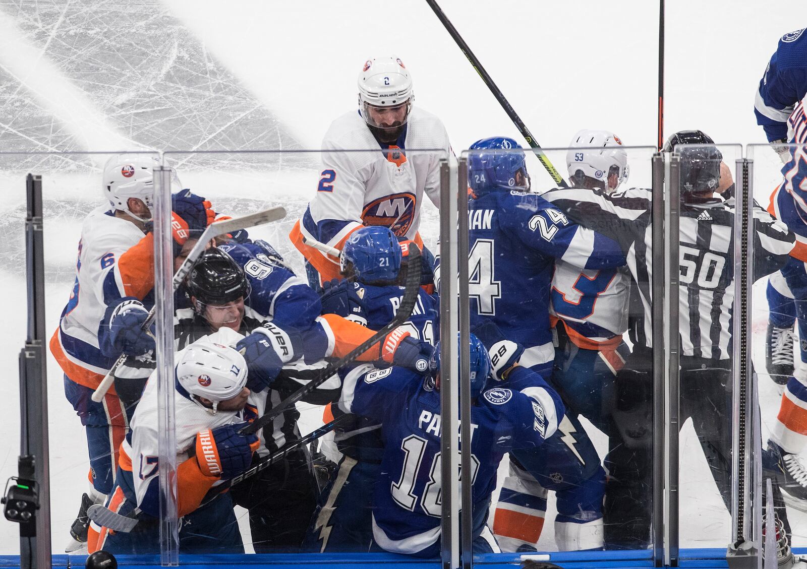 Tampa Bay Lightning and the New York Islanders tangle during the first period of Game 2 of the NHL hockey Eastern Conference final, Wednesday, Sept. 9, 2020, in Edmonton, Alberta. (Jason Franson/The Canadian Press via AP)