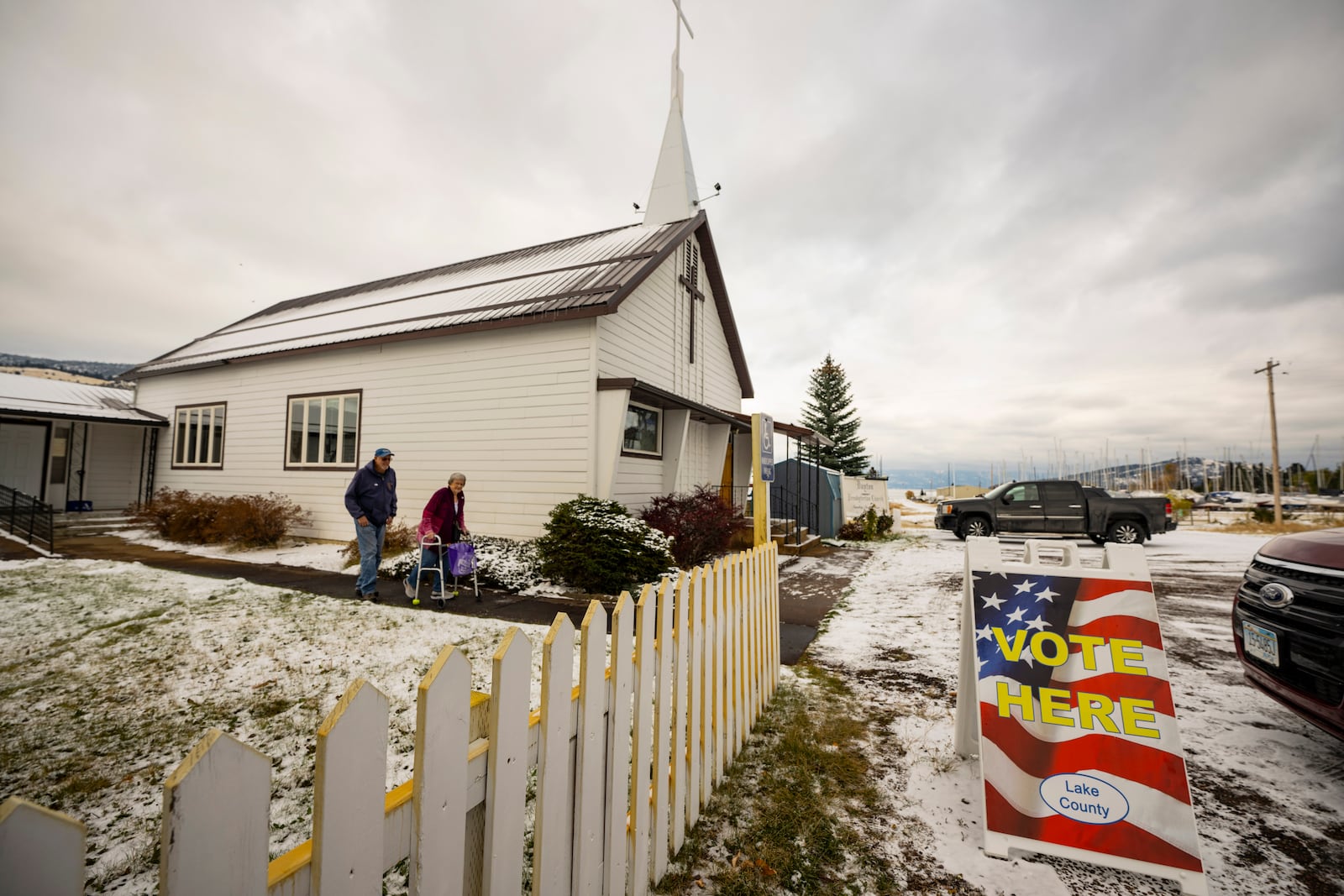 FILE - Terry and Linda Gore leave the Dayton church on the Flathead Indian Reservation after voting, Nov. 8, 2022, in Arlee, Mont. (AP Photo/Tommy Martino, File)