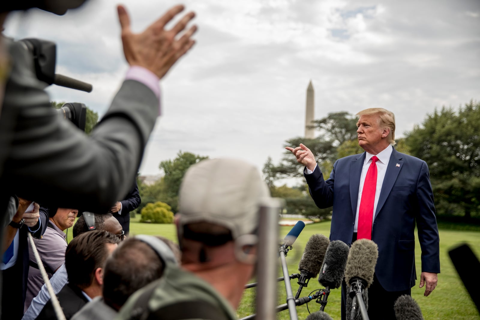 FILE - President Donald Trump takes a question from a reporter on the South Lawn of the White House in Washington, Sept. 9, 2019. (AP Photo/Andrew Harnik, File)