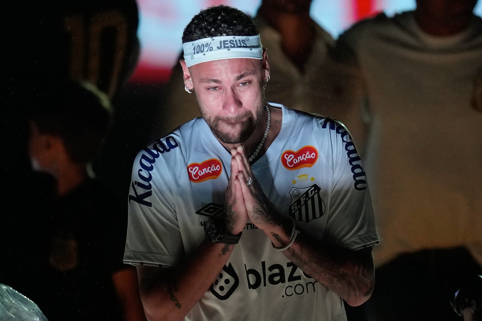 Brazilian soccer player Neymar reacts during his presentation ceremony after signing a six-month contract with Santos FC at Vila Belmiro Stadium in Santos, Brazil, Friday, Jan. 31, 2025. (AP Photo/Andre Penner)