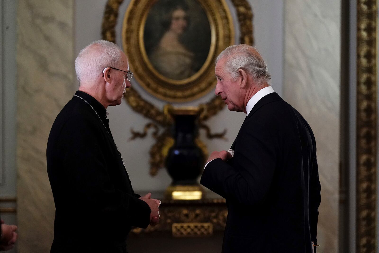 FILE - Britain's King Charles III speaks to Archbishop of Canterbury, Justin Welby, as he meets with faith leaders during a reception at Buckingham Palace, London, Friday Sept. 16, 2022. (Aaron Chown/Pool Photo via AP, File)