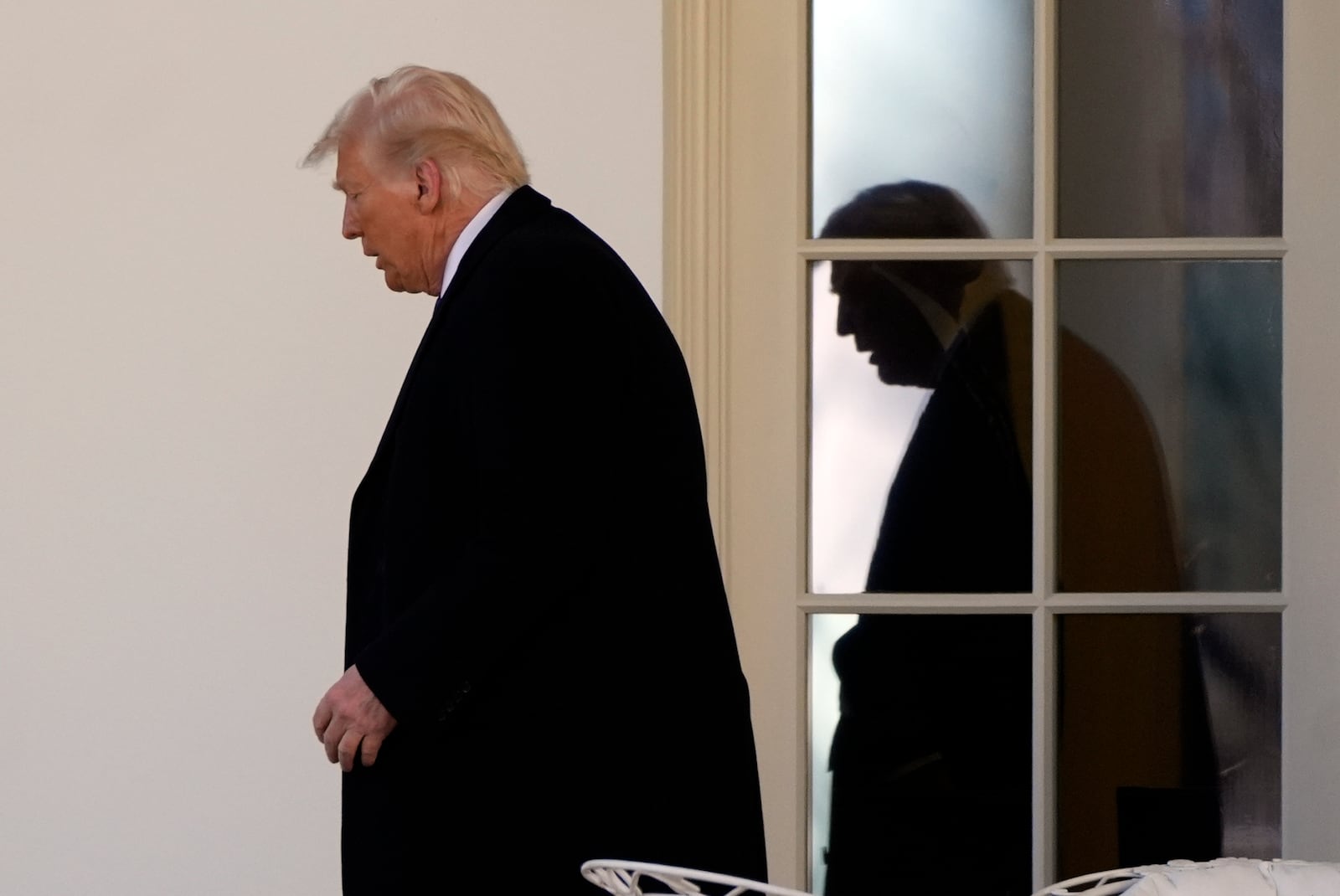 President Donald Trump walks from the Oval Office to departing on Marine One from the South Lawn of the White House, Friday, Feb. 14, 2025, in Washington. (AP Photo/Alex Brandon)