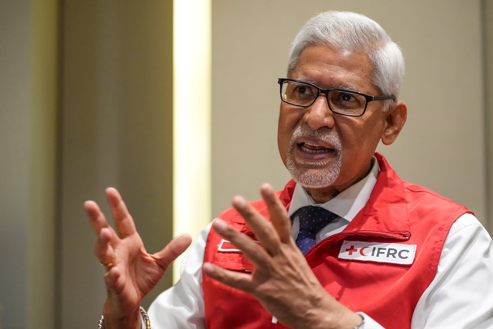 Jagan Chapagain, Secretary-General of the International Federation of Red Cross and Red Crescent Societies (IFRC) speaks during an interview with The Associated Press, in Beirut, Lebanon, Tuesday, Nov. 5, 2024. (AP Photo/Hassan Ammar)