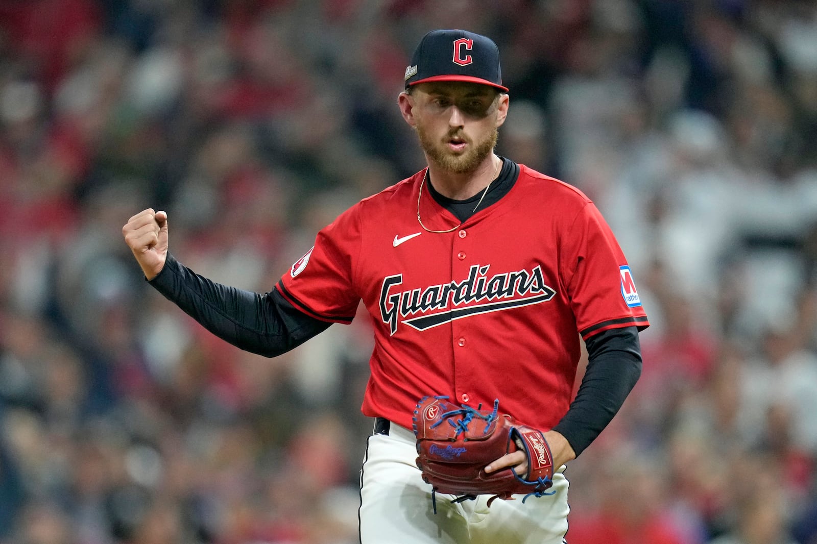 Cleveland Guardians starting pitcher Tanner Bibee reacts after striking out New York Yankees' Aaron Judge during the third inning in Game 5 of the baseball AL Championship Series Saturday, Oct. 19, 2024, in Cleveland. (AP Photo/Sue Ogrocki)