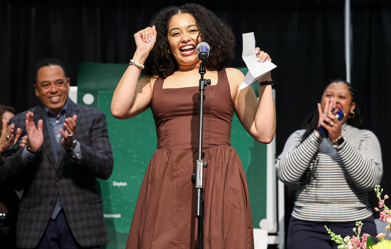 Simone Stinnette dances after announcing she matched with a program at Emory University's School of Medicine in Atlanta during Wright State University Boonshoft School of Medicine's Match Day ceremony on Friday at the Apollo Room in the university's Student Union. BRYANT BILLING / STAFF