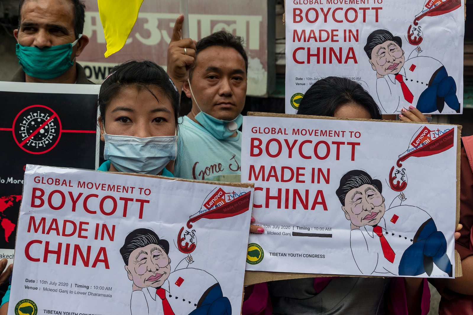 FILE- In this July 10, 2020 file photo, members of the Tibetan Youth Congress participate in a street protest calling for the boycott of Chinese goods in Dharmsala, India. Tensions along the disputed India-China border seem to be getting worse rather than better, three months after their deadliest confrontation in decades in June. The Asian giants accused each other this week of sending soldiers into each other’s territory and fired warning shots for the first time in 45 years, raising the specter of full-scale military conflict. (AP Photo/Ashwini Bhatia, File)