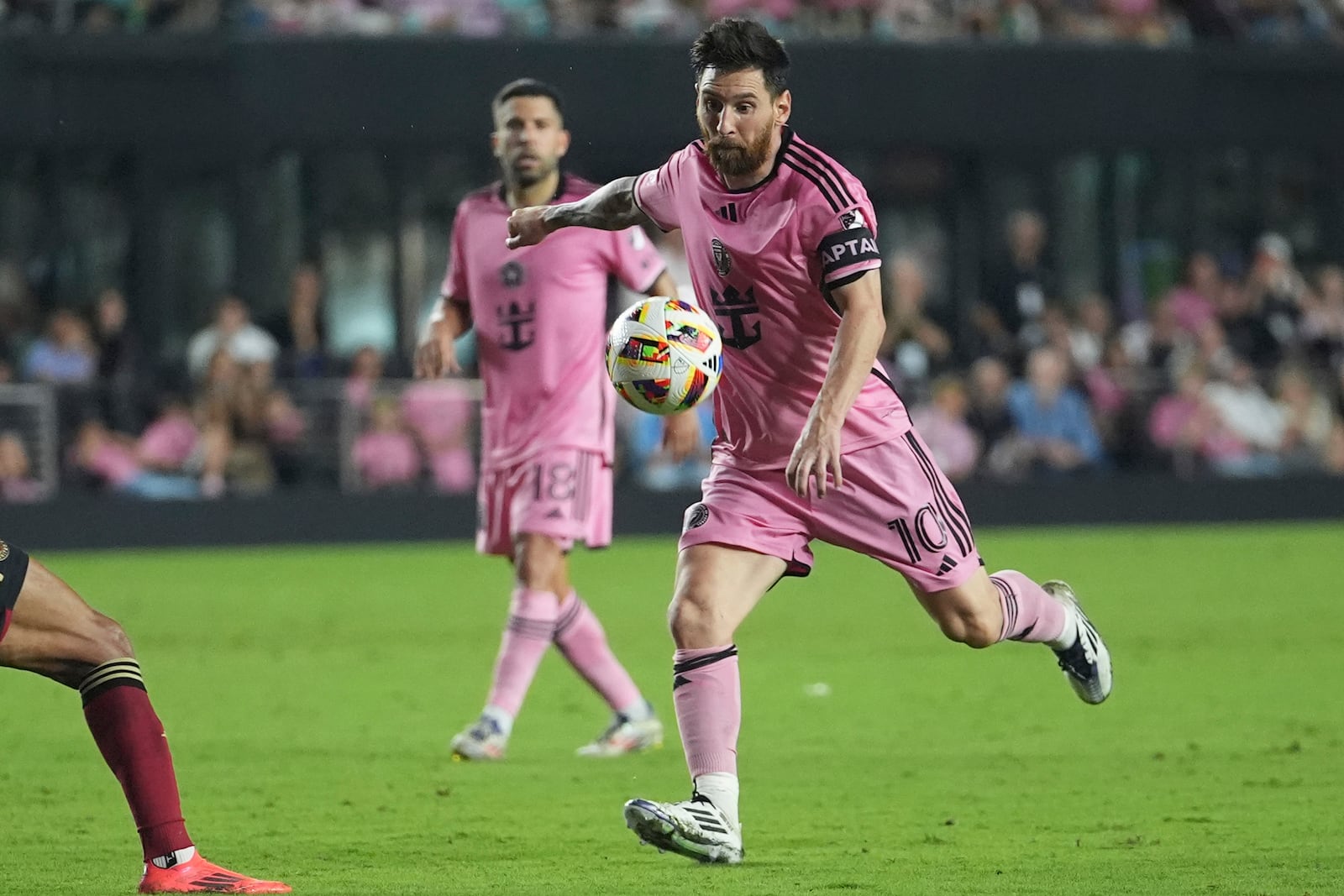 Inter Miami forward Lionel Messi (10) aims the ball during the second half of their MLS playoff opening round soccer match against Atlanta United, Saturday, Nov. 9, 2024, in Fort Lauderdale, Fla. (AP Photo/Lynne Sladky)