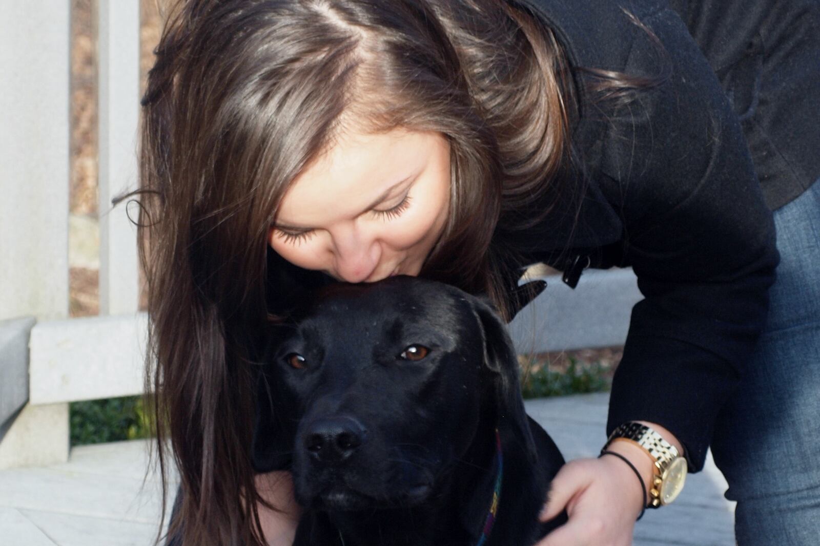 Teddy greeted Jordan excitedly with tail wagging. He had seen her occasionally so his behaviors, including nudging and asking for tummy rubs, amounted to his usual “happy to see big sis” routine. Contributed by Karin Spicer