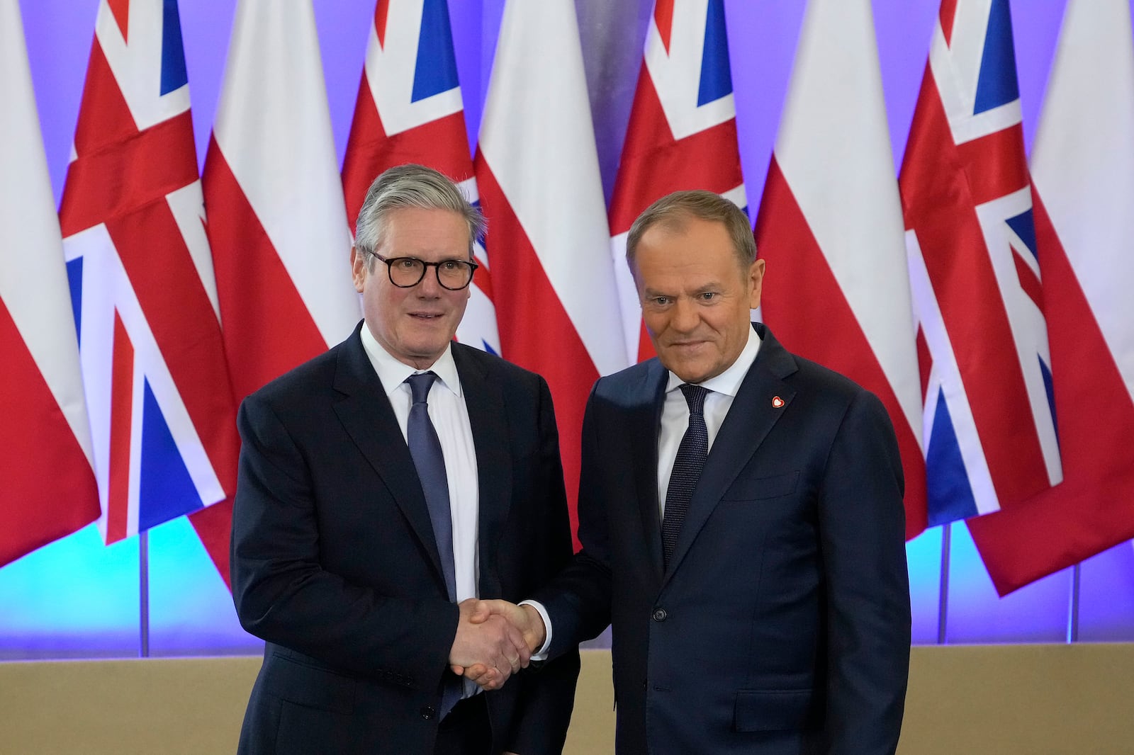 Britain's Prime Minister Keir Starmer meets Polish Prime Minister Donald Tusk, right, in Warsaw, Friday, Jan. 17, 2025. (AP Photo/Czarek Sokolowski)