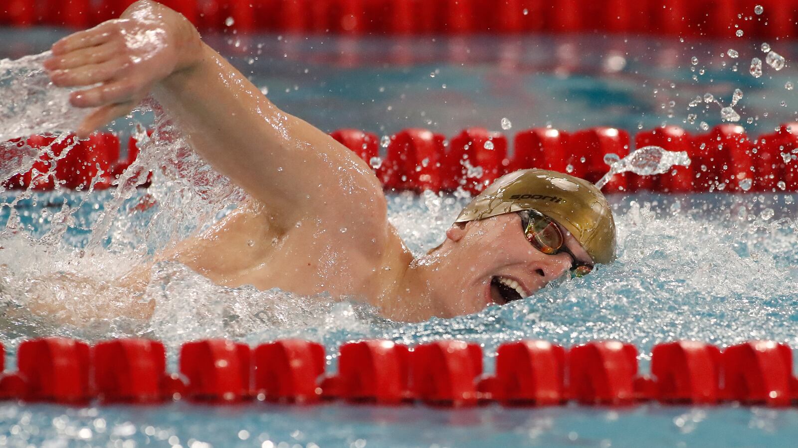 Kenton Ridge High School sophomore Evan Blazer swims during the Clark County Invitational on Sunday morning at the Springfield Family YMCA in Springfield. CONTRIBUTED PHOTO BY MICHAEL COOPER