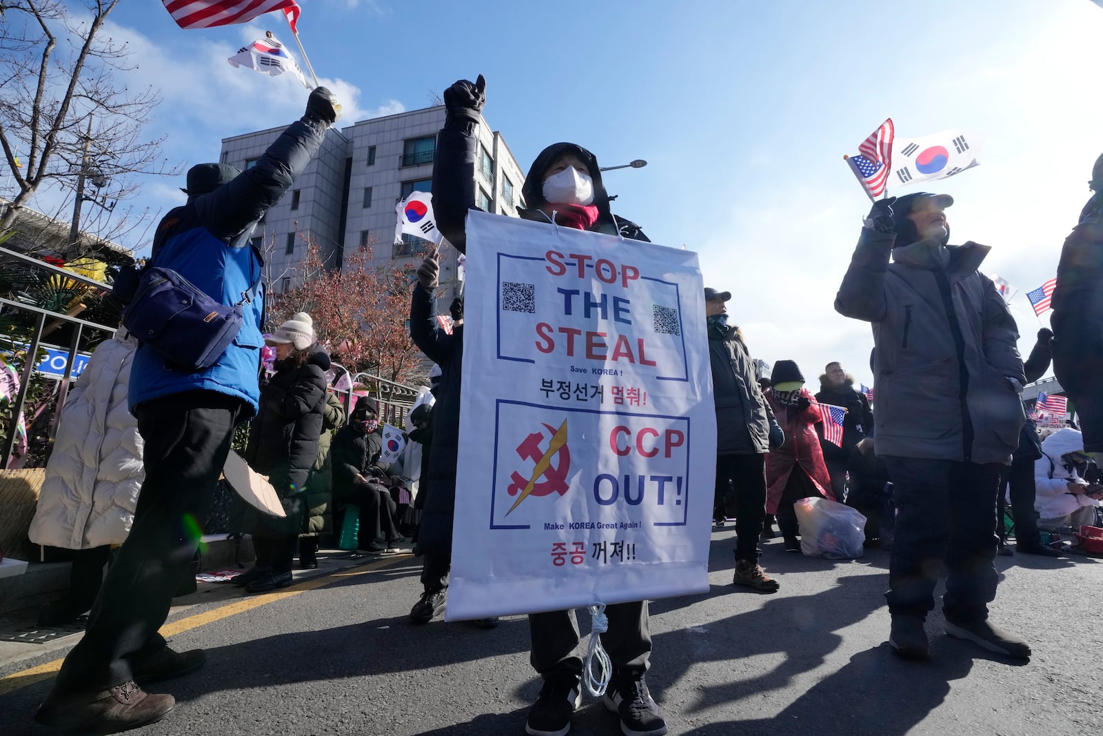 Supporters of impeached South Korean President Yoon Suk Yeol attend a rally to oppose his impeachment near the presidential residence in Seoul, South Korea, Thursday, Jan. 9, 2025. (AP Photo/Ahn Young-joon)