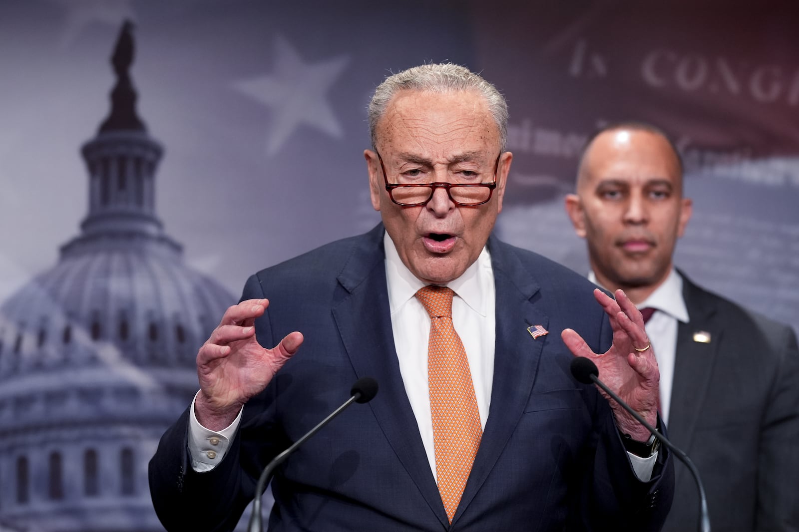 Senate Minority Leader Chuck Schumer, D-N.Y., and House Minority Leader Hakeem Jeffries, D-N.Y., right, express their alarm to reporters about actions by President Donald Trump and his adviser Elon Musk, on Capitol Hill in Washington, Tuesday, Feb. 4, 2025. Democrats fear Musk is wielding power within the federal government without accountability and potentially against the law. (AP Photo/J. Scott Applewhite)