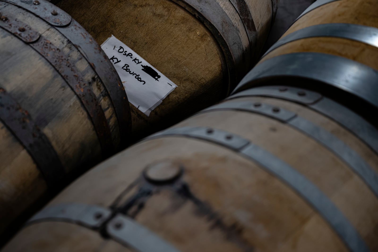 Bourbon barrels with product in them are seen inside of the Brough Brothers Distillery that is under construction in Louisville, Ky., Saturday, March 8, 2025. (AP Photo/Jon Cherry)