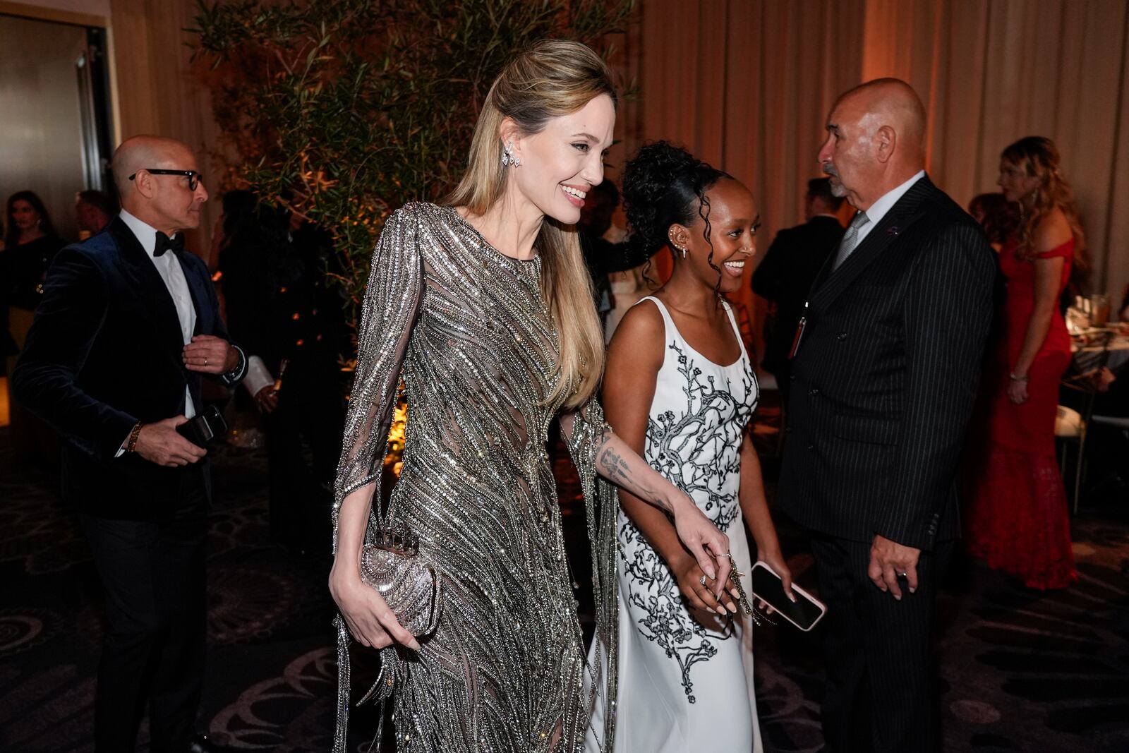 Angelina Jolie, left, and Zahara Marley Jolie arrive at the 82nd Golden Globes on Sunday, Jan. 5, 2025, at the Beverly Hilton in Beverly Hills, Calif. (AP Photo/Chris Pizzello)