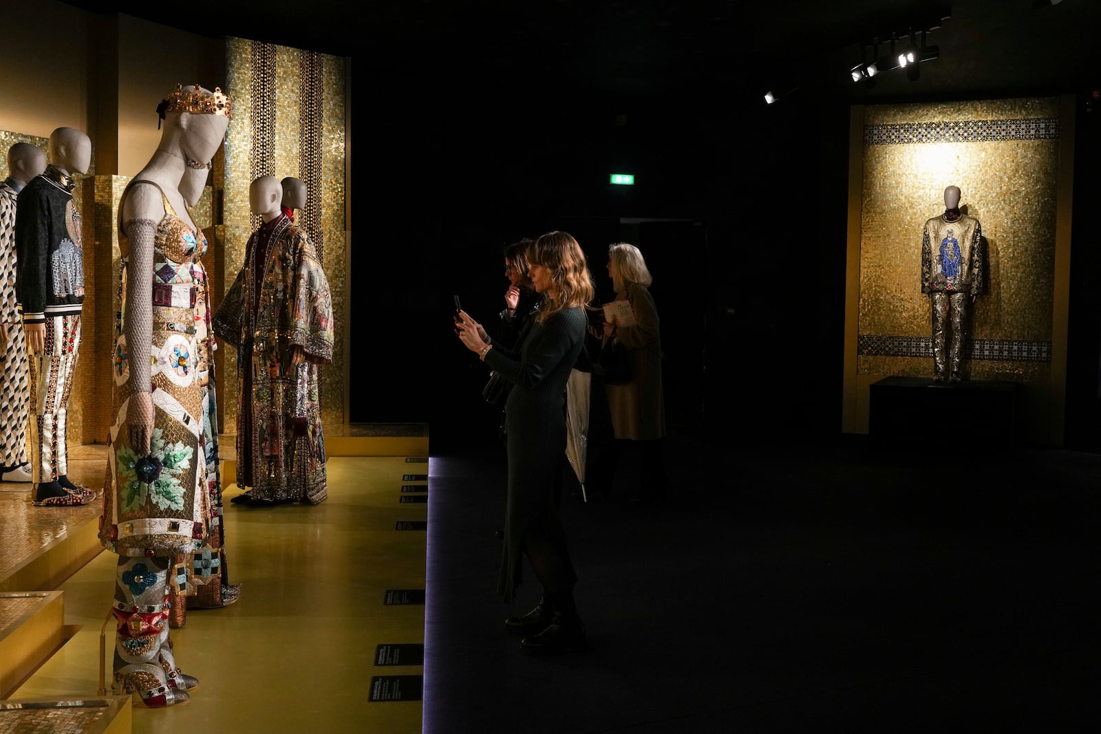 Creations are displayed during the exhibition "From the Heart to the Hands: Dolce&Gabbana" at the Grand Palais, in Paris, Thursday, Jan. 9, 2025. (AP Photo/Thibault Camus)