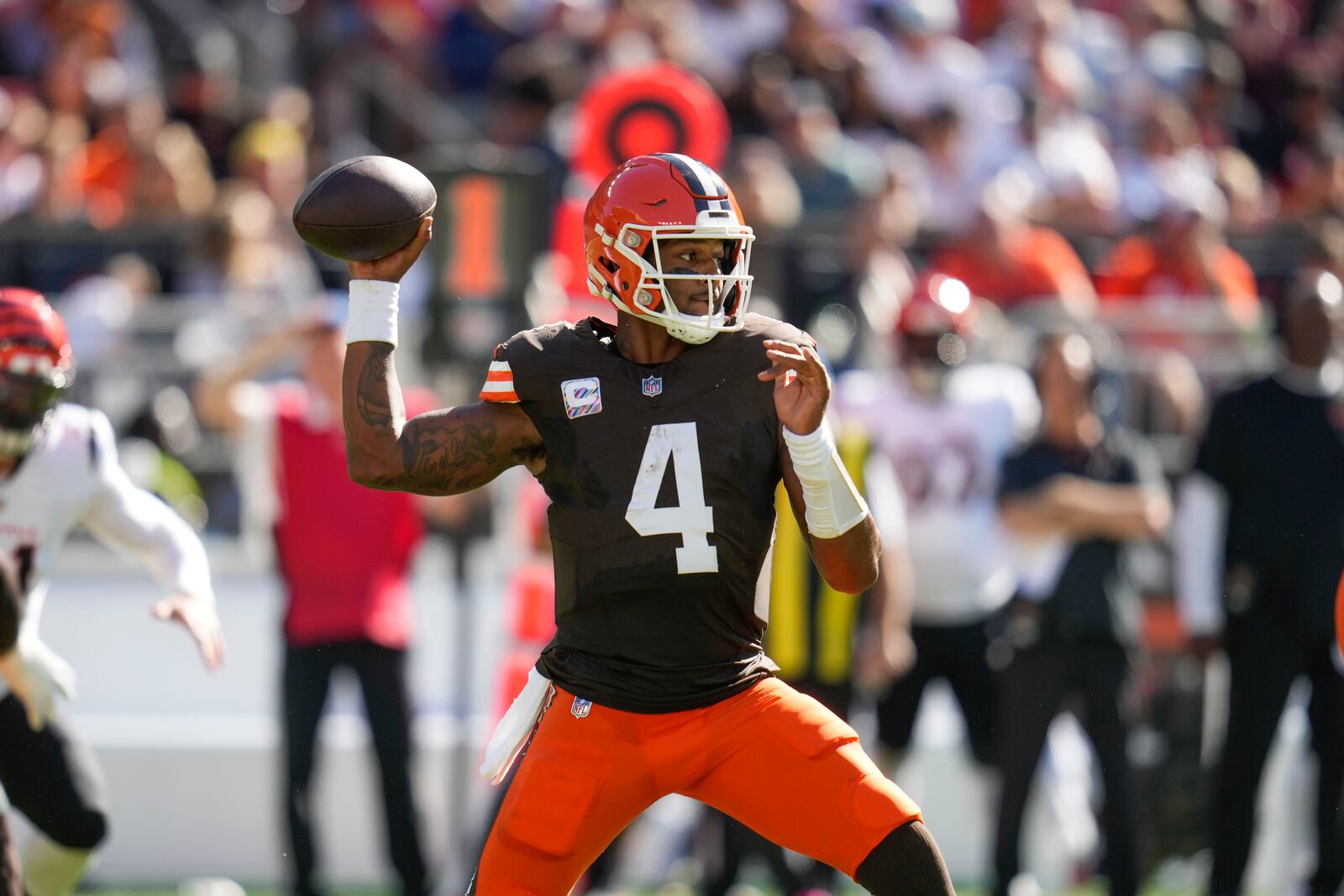 Cleveland Browns quarterback Deshaun Watson (4) passes in the first half of an NFL football game against the Cincinnati Bengals, Sunday, Oct. 20, 2024, in Cleveland. (AP Photo/Sue Ogrocki)