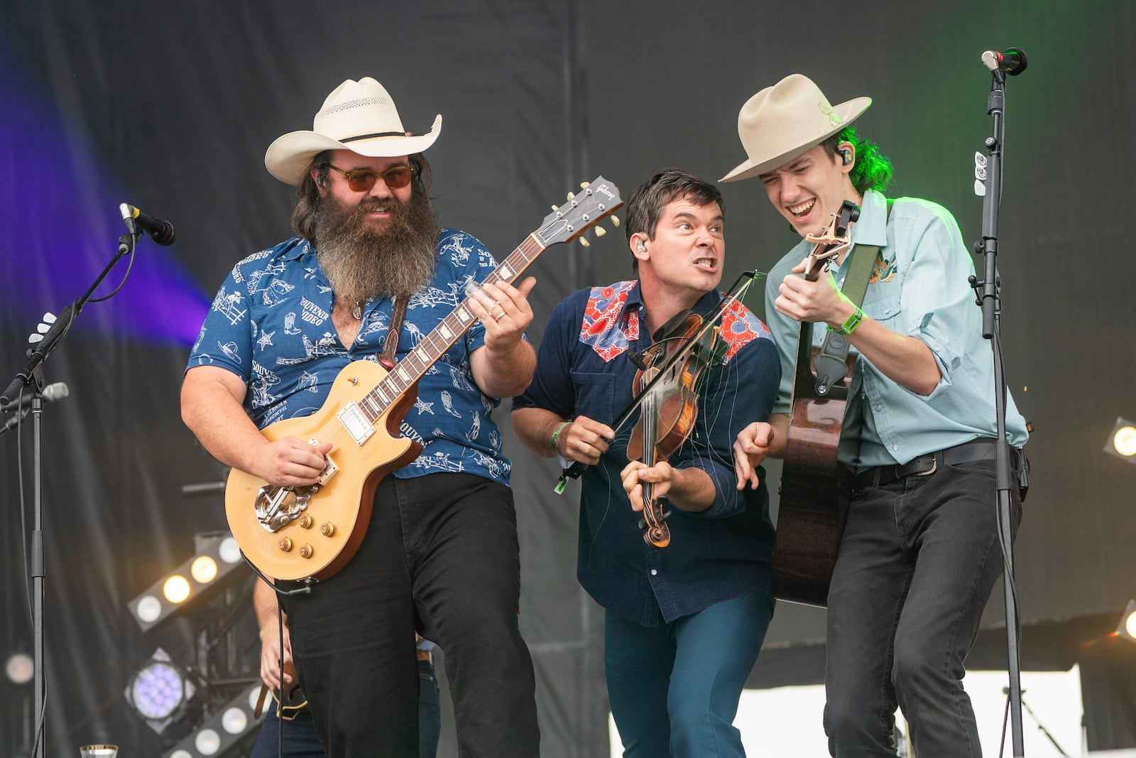 Mike Harris, left, Ketch Secor and Mason Via of Old Crow Medicine Show perform during the Bourbon and Beyond Music Festival, Saturday, Sept. 16, 2023, at Kentucky Exposition Center in Louisville, Ky. (Photo by Amy Harris/Invision/AP)