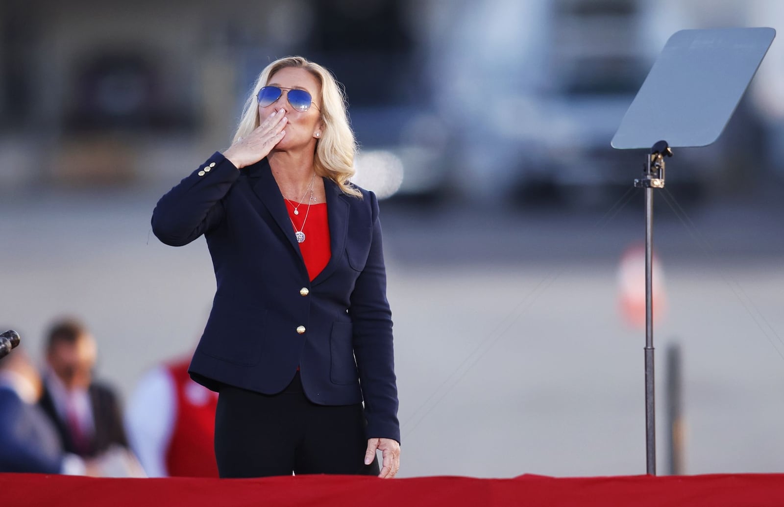 Georgia Republican U.S. Rep. Taylor Greene speaks to the crowd during a Trump Rally Monday, Nov. 7, 2022, at Dayton International Airport in Dayton. NICK GRAHAM/STAFF