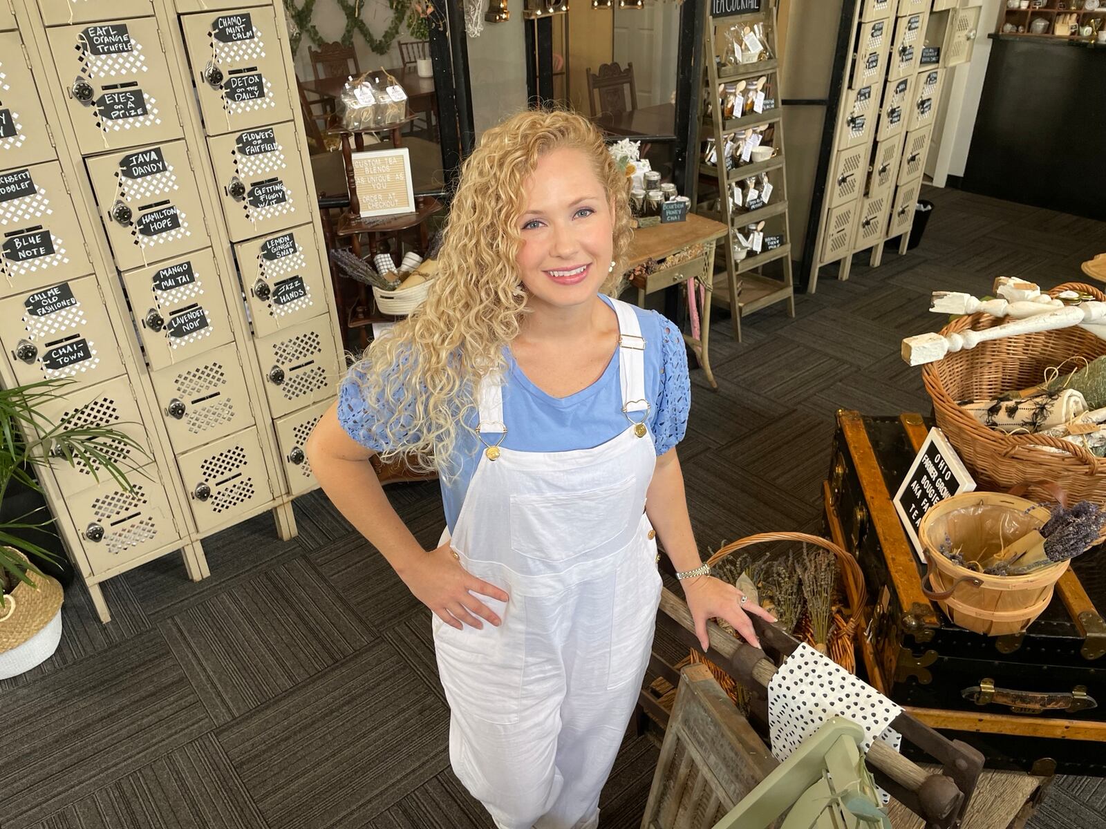 Kinship, a home goods and tea shop, opened in downtown Hamilton at the corner of South 3rd and Ludlow streets. Pictured on Friday, July 29, 2022, is owner Cass Ruhlman, who opened in the former Blank Space location earlier this year. MICHAEL D. PITMAN/STAFF