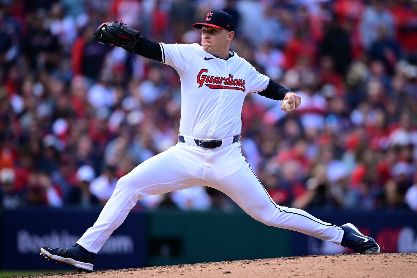 Cleveland Guardians' Erik Sabrowski pitches in the fourth inning during Game 5 of baseball's American League Division Series against the Detroit Tigers, Saturday, Oct. 12, 2024, in Cleveland. (AP Photo/David Dermer)