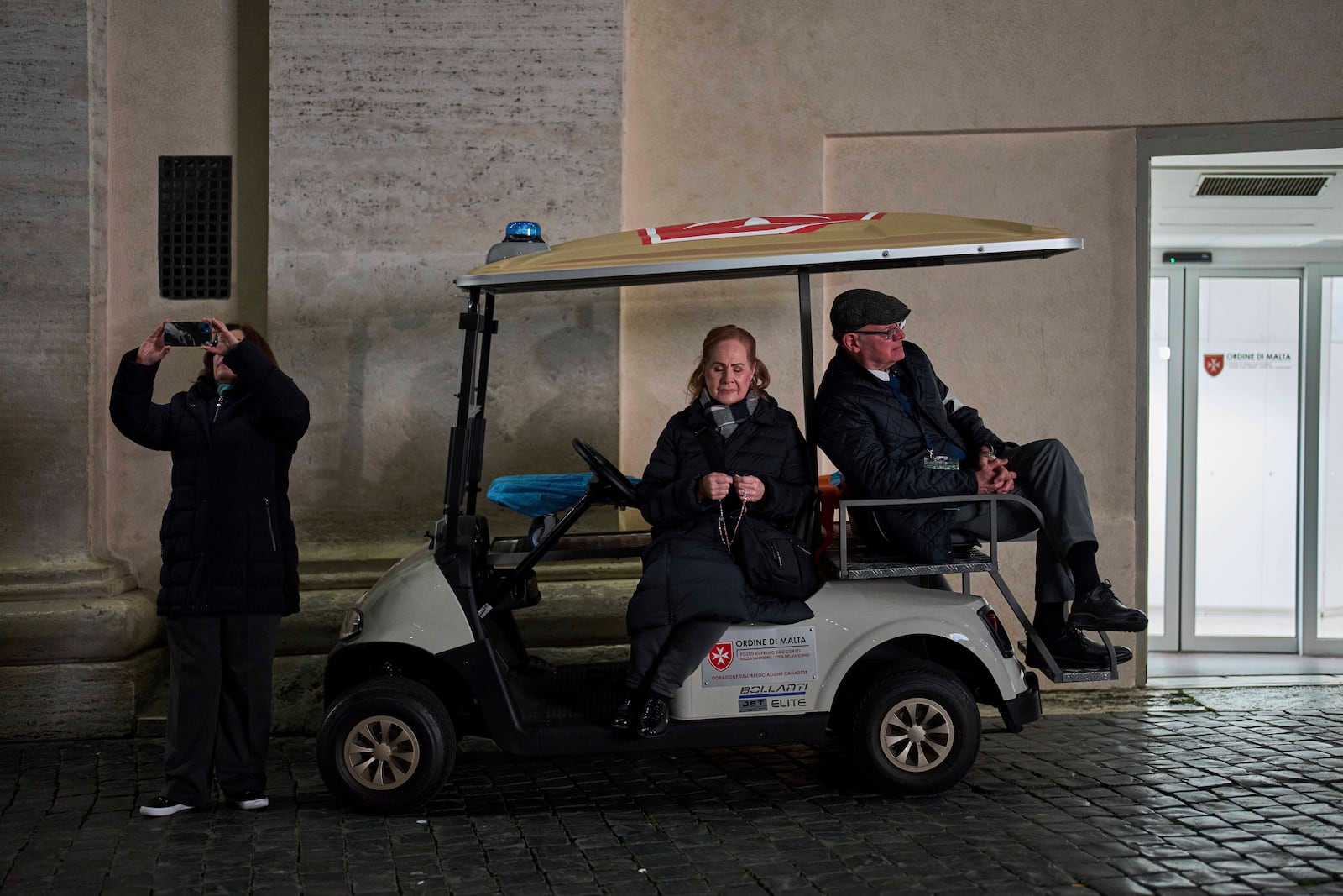 Catholic worshippers attend a nightly rosary prayer service for Pope Francis in St. Peter's Square at the Vatican, Thursday, March 6, 2025. (AP Photo/Francisco Seco)