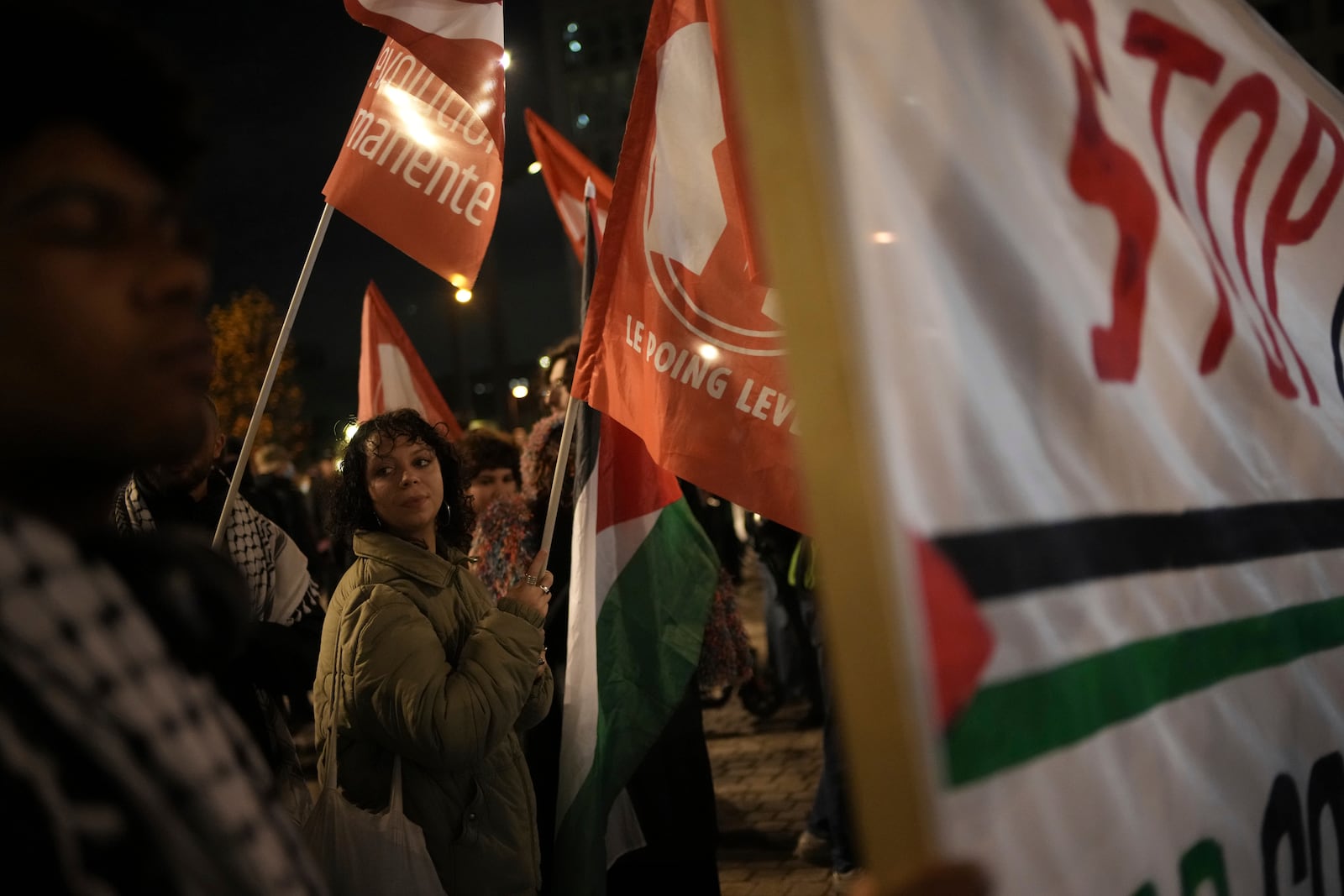 Demonstrators attend a rally in support of the Palestinian people, ahead of the Nations League soccer match France against Israel, Thursday, Nov. 14, 2024 in Saint-Denis, outside Paris. (AP Photo/Christophe Ena)