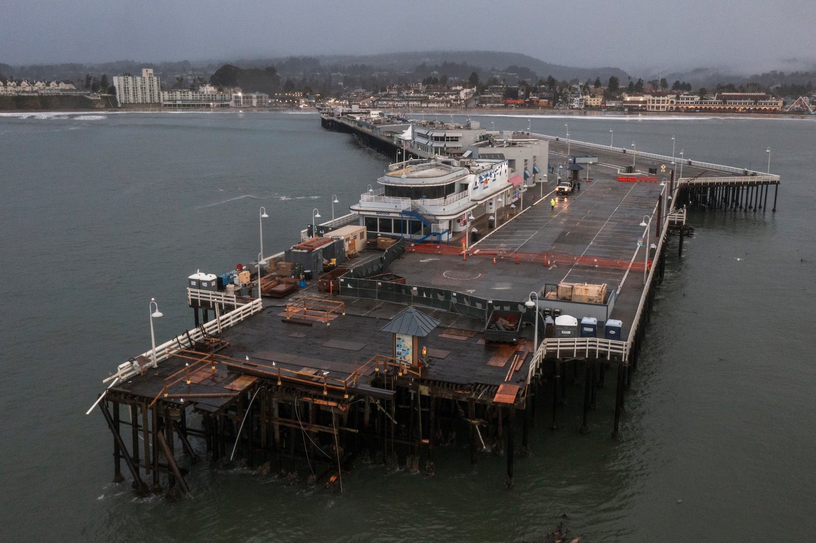 The damaged Santa Cruz Wharf is visible in Santa Cruz, Calif., Tuesday, Dec. 24, 2024. (AP Photo/Nic Coury)