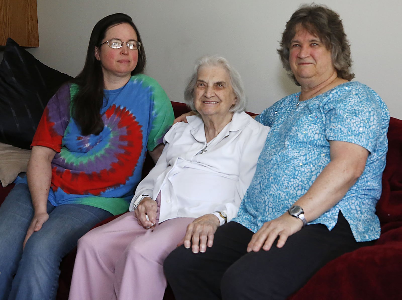 Jeanette Acker, center, with her caretakers, granddaughter Jennifer Martin, left, and daughter Pat Acker, right. TY GREENLEES / STAFF