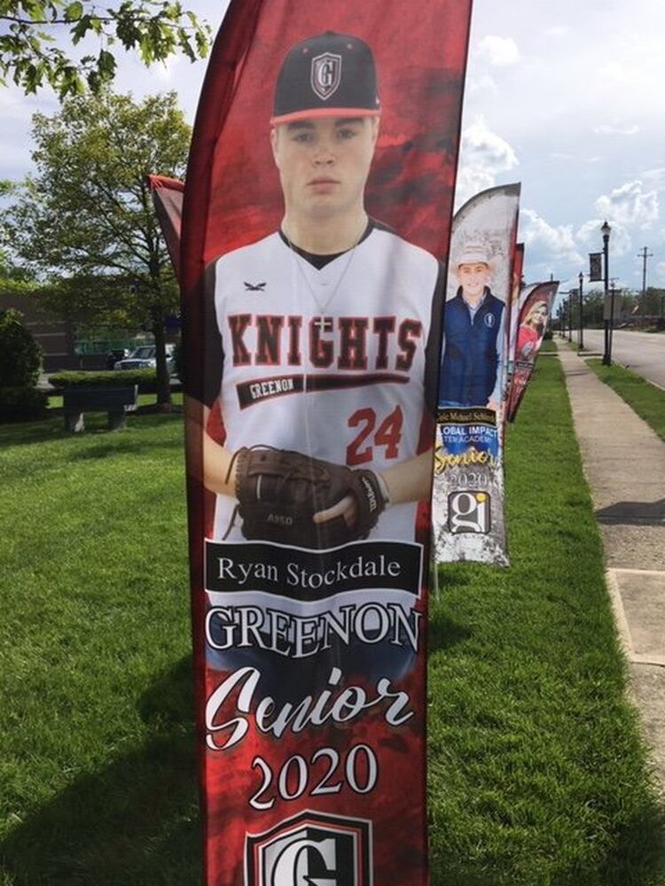 PHOTOS: Enon park features Class of 2020 photo flags to honor graduates